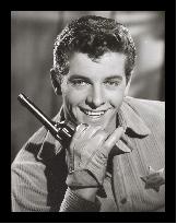 Peter Brown smiling about his revolver